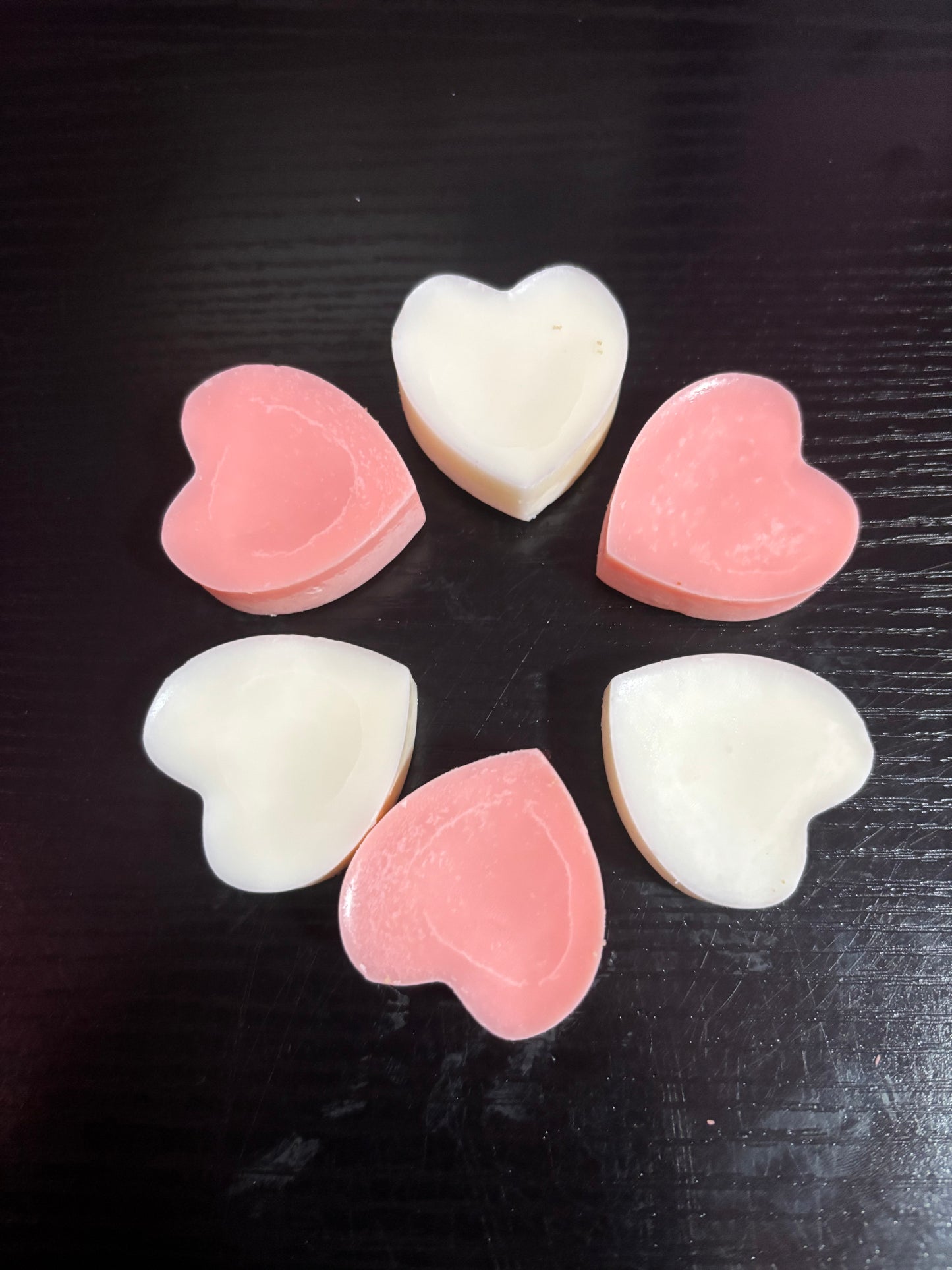 Six heart shaped wax melts