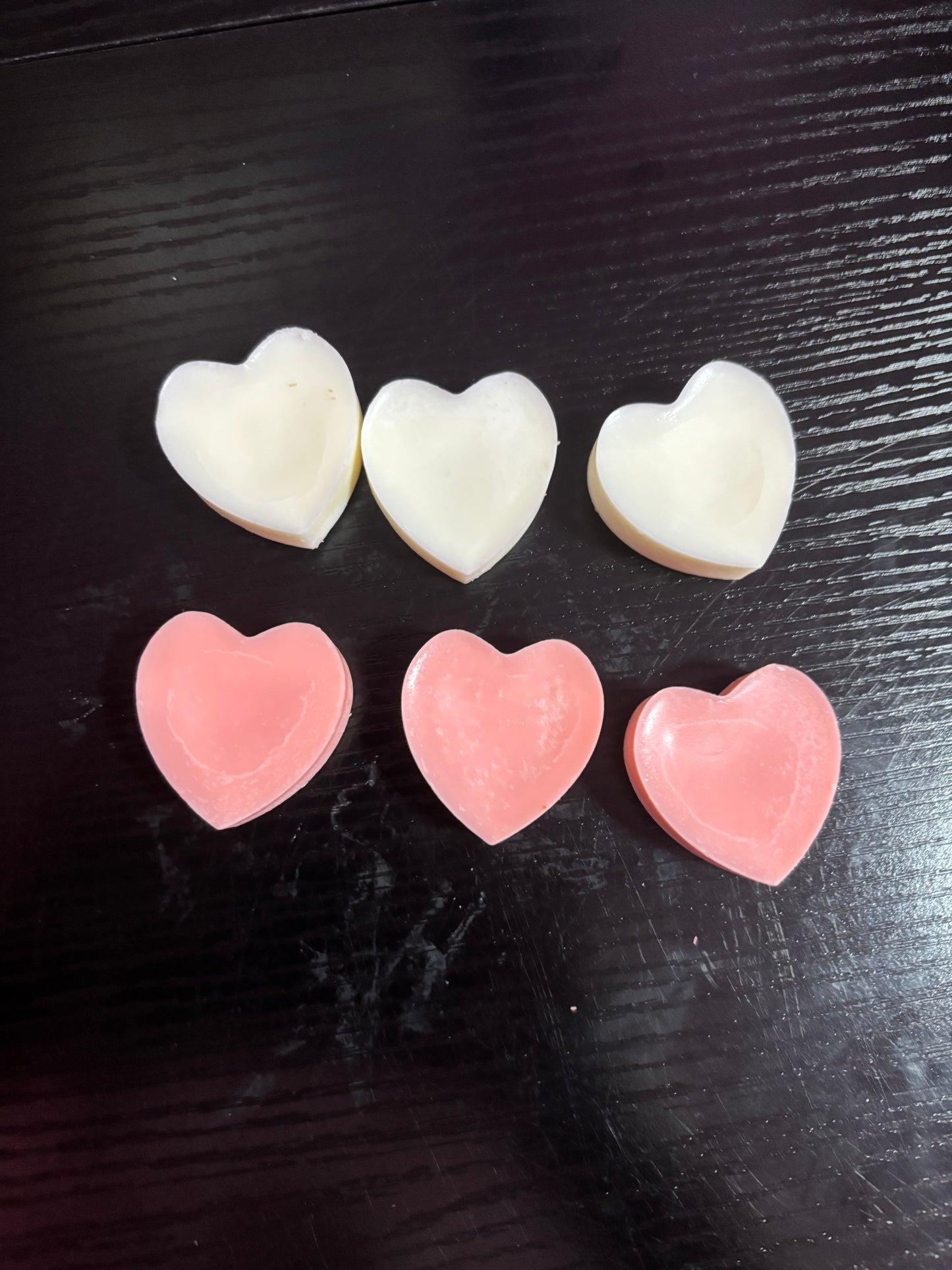 Six heart shaped wax melts