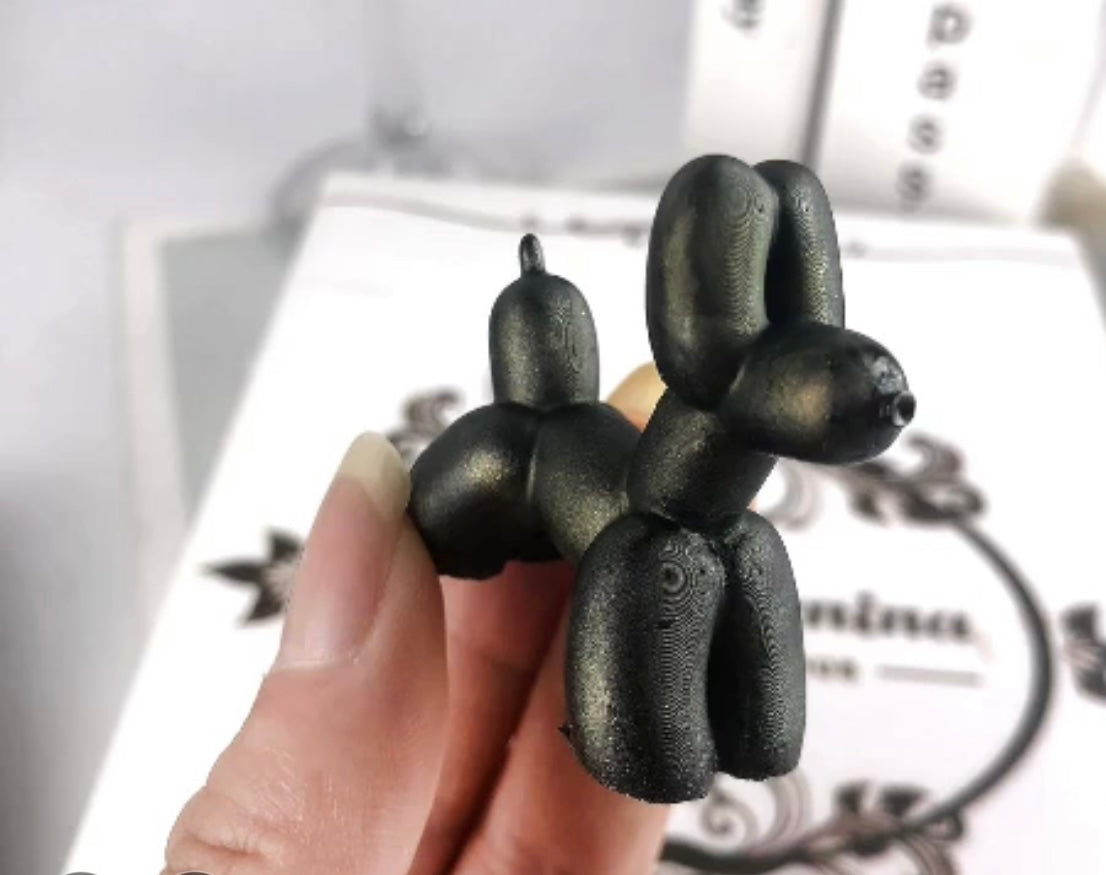 Balloon puppy candle