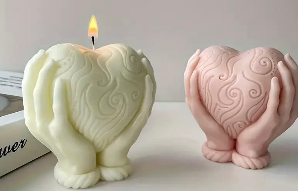 Heart in hands candle